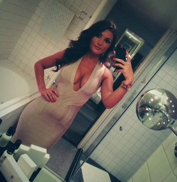 Brunette Babe Takes Self Pic Of Her Cleavage