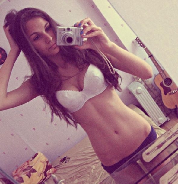 Sexy Guitarist Takes Selfie